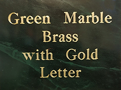 Green Marble Background Gold Letters